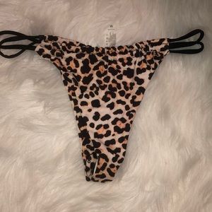 Beautiful cheeky cheetah bathing suit bottom